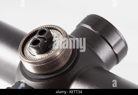 Turret and dial inside for changing elevation on a rifle scope Stock Photo