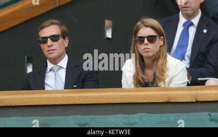 LONDON, ENGLAND - JULY 02: Catherine, Duchess of Cambridge and Prince William, Duke of Cambridge attend the Andy Murray vs Grigor Dimitrov match on centre court during day nine of the Wimbledon Championships at Wimbledon on July 2, 2014 in London, England.  People:  Princess Beatrice of York, Dave Clark  Transmission Ref:  MNC  Hoo-Me.com / MediaPunch Stock Photo