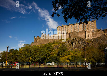 City landmark historic fortress which dominates the skyline on a sunny day  Edinburgh Castle south point The New Barracks  built on a volcanic rock Stock Photo