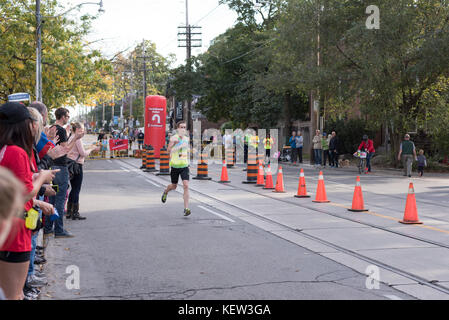 Toronto, Canada. 22nd Oct, 2017. Canadian marathon runner David Freake passing the 33km turnaround point at the 2017 Scotiabank Toronto Waterfront Marathon. He achieves the twenty-fourth place in the race. Credit: YL Images/Alamy Live News Stock Photo