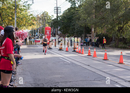 Toronto, Canada. 22nd Oct, 2017. Canadian marathon runner Eoin Craigie passing the 33km turnaround point at the 2017 Scotiabank Toronto Waterfront Marathon. He achieves the twenty-fifth place in the race. Credit: YL Images/Alamy Live News Stock Photo