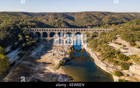 Aerial view of Pont du Gard, an ancient Roman aqueduct that crosses the Gardon River in southern France Stock Photo