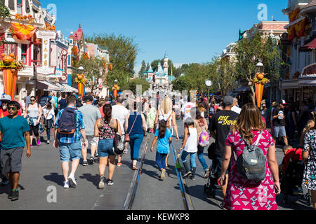 ANAHEIM, CA - OCTOBER 16, 2017: Disneyland's Main Street crowded with guests on a very busy day at the theme park. Stock Photo