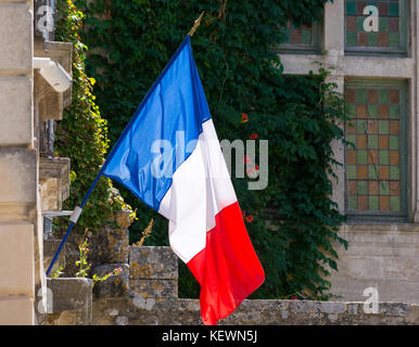 Flag of France (French: Drapeau français) is a tricolour flag featuring three vertical bands coloured blue (hoist side), white, and red. Oudoors, blue Stock Photo