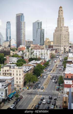 Residential development in Downtown Brooklyn, including the Williamsburg Savings Bank building, right, and the surrounding areas in New York on Saturday, October 14, 2017. Because of increased development in the area, notably hi-rise luxury apartment buildings, chain stores and high-end retailers are moving in. Fourth Avenue is seen in the image.(© Richard B. Levine) Stock Photo