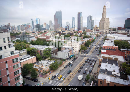 Residential development in Downtown Brooklyn, including the Williamsburg Savings Bank building, right, and the surrounding areas in New York on Saturday, October 14, 2017. Because of increased development in the area, notably hi-rise luxury apartment buildings, chain stores and high-end retailers are moving in. Fourth Avenue is seen in the image.(© Richard B. Levine) Stock Photo