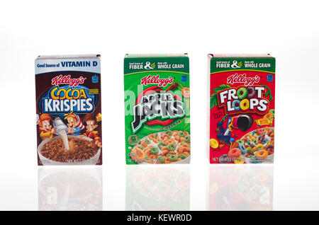 Unopened boxes of Kellogg’s Cocoa Krispies, Apple Jacks and Froot Loops Cereals on white background America Stock Photo