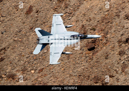 United States Navy Boeing EA-18G Growler from the VX-9 Vampires squadron flies low level on the Jedi Transition through Star Wars Canyon / Rainbow Canyon, Death Valley National Park, Panamint Springs, California, United States of America Stock Photo