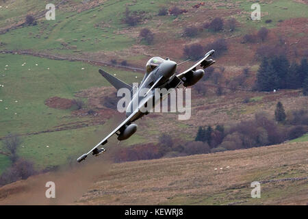 Royal Air Force Eurofighter Typhoon FGR4 flies low level through the Mach Loop, Machynlleth, Wales, United Kingdom