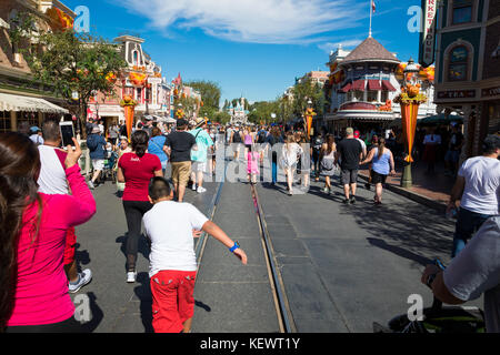 ANAHEIM, CA - OCTOBER 16, 2017: Disneyland's Main Street crowded with guests on a very busy day at the theme park. Stock Photo