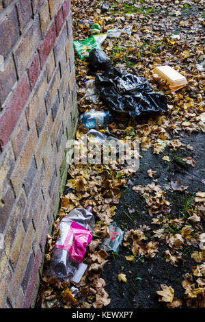 Trash and litter leaves suburban pollution. Stock Photo