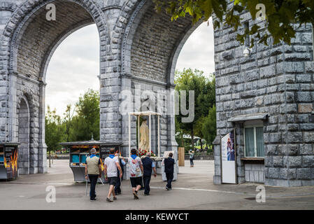 Pilgrims procession to Mass, Lourdes, Pyrenees, France, Europe. Stock Photo