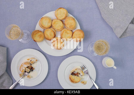 Christmas food, mince pies with champagne. Stock Photo