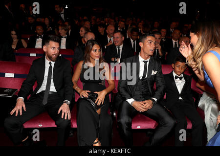 (left to right) Lionel Messi, Antonella Roccuzzo and Cristiano Ronaldo ...