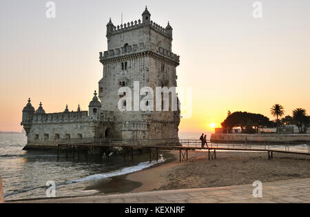 Torre de Belém (Belém Tower), a UNESCO World Heritage Site built in the 16th century in Portuguese Manueline Style at twilight. The River Tagus in the Stock Photo