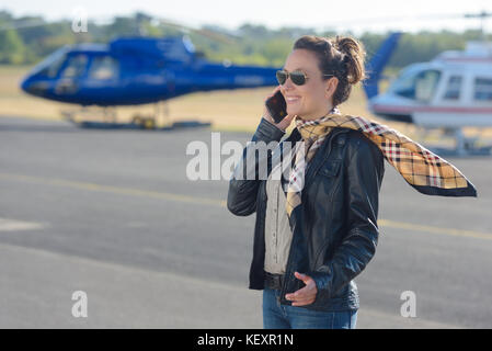 young woman helicopter pilot Stock Photo