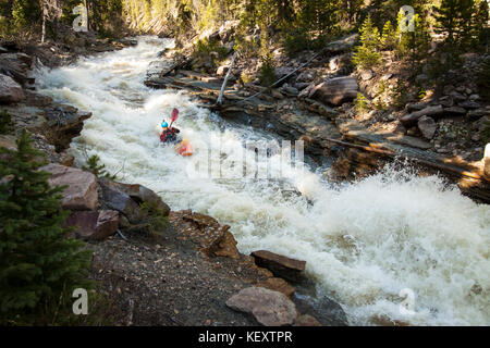 View of person kayaking on Provo River, Uinta Mountains, Utah, USA Stock Photo