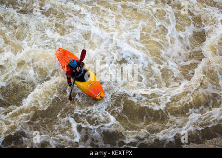 View from above of person sitting in kayak on Provo River, Uinta Mountains, Utah, USA Stock Photo