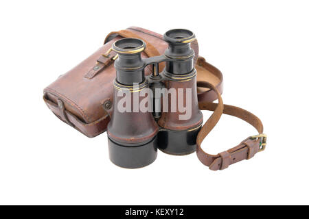 French binocular of 19 century with leather box. Was popular both by French civilian and the military. With path on white background. Used in WWI. Stock Photo