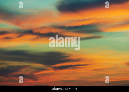 beautiful clouds and sunset sky. vintage filter and film style. Stock Photo
