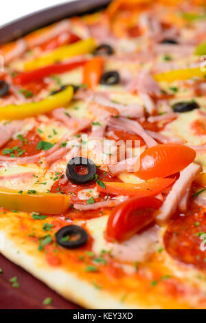 Delicious pizza on wooden tray Stock Photo