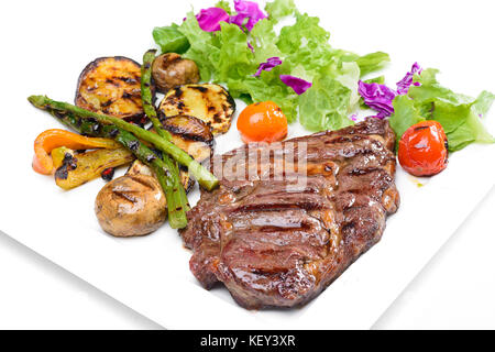 Beef steak with potatoes and Greens Stock Photo