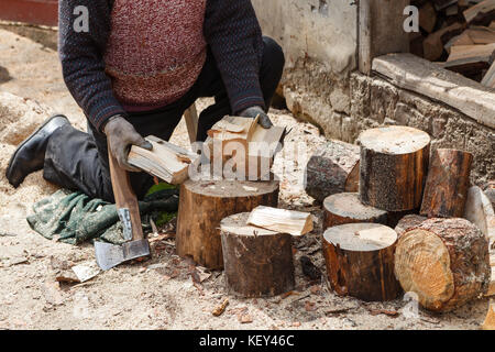 Choping firewood for winter Stock Photo