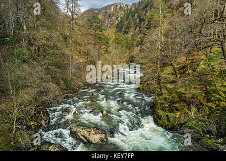 Afon (River) Glaslyn flowing through the Aberglaslyn Pass looking north from the bridge near Nantmor south of Beddgelert North Wales UK March 3596 Stock Photo