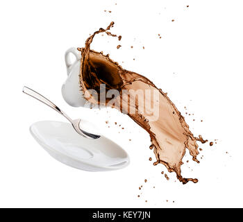 cup of coffee spils with saucer, spoon and coffee falls on white background Stock Photo