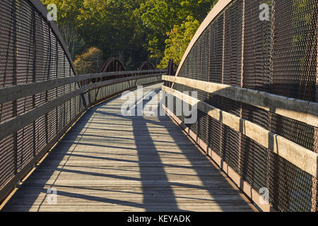 Pedestrian bridge over the Youghiogheny River on the Great Allegheny Passage Trail at Ohiopyle, Pennsylvania, USA Stock Photo