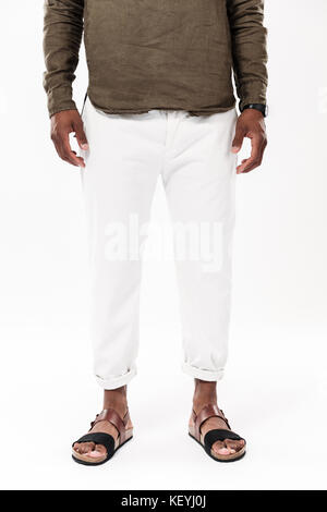 Vertical cropped image of african man over white background Stock Photo