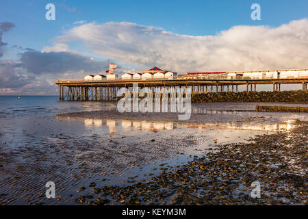 Views of Herne Bay pier in the warm evening light, and the Thames Estuary, Kent, UK Stock Photo