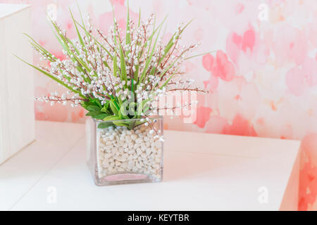 Small beautiful tree in the glass decorate on the table. Stock Photo
