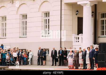 Vilnius, Lithuania. People Take Part In Statehood Day On Square Near Presidential Palace. Holiday In Commemorate Coronation In 1253 Of Mindaugas King. Stock Photo