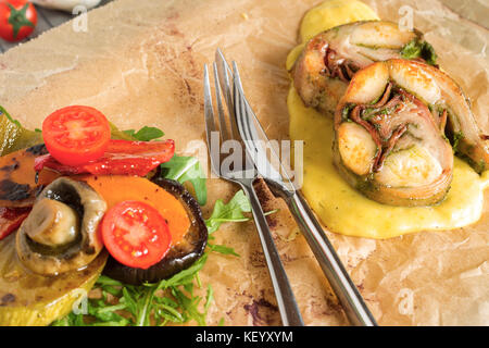Roast rabbit meat with steamed vegetables and puree. Stock Photo