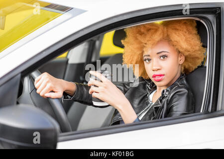 Portrait of a beautiful african woman in the car Stock Photo