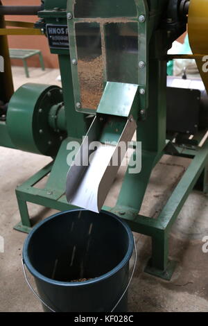 Coffee bean dehusking machine, El Trapiche (Sugar Mill) farm tour, near Santa Elena, Guanacaste province, Costa Rica, Central America Stock Photo