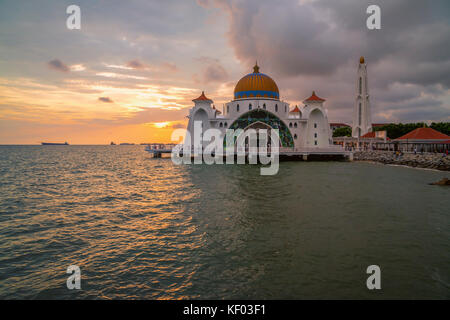 Beautiful sunset over the mosque, Malacca Straits Floating Mosque (Masjid Selat Melaka). Stock Photo