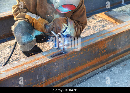 Welding work, welder welding metal material in heavy industry manufacturing, video clip Stock Photo