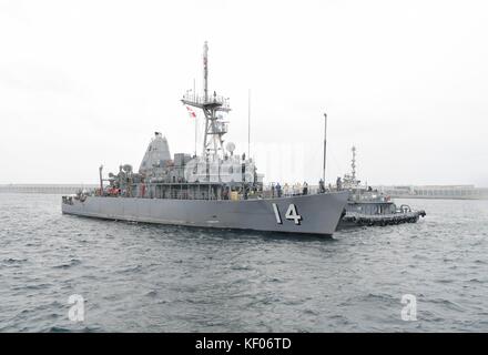 The U.S. Navy Avenger-class mine countermeasures ship USS Chief arrives at Jeju Island for a port visit September 26, 2017 in Jeju-Do, South Korea. Stock Photo