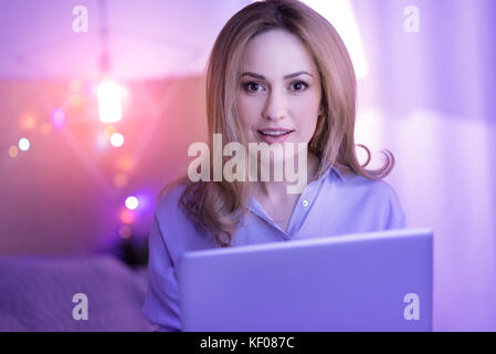 Happy businesswoman working from home Stock Photo