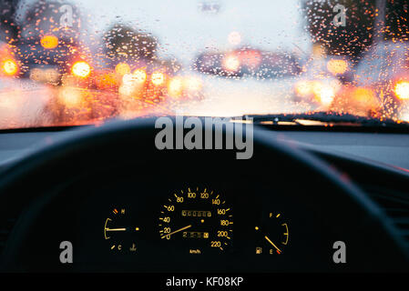 rain droplets on car windshield, blocked traffic Stock Photo