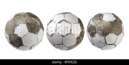 WornOut  Footballs on White Background Stock Photo