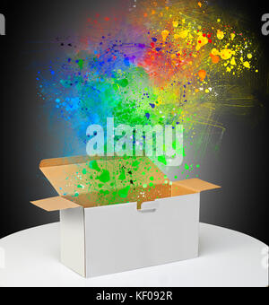 Colour splatter from earth shape on Real Cardboard box Stock Photo