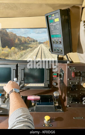 Moving Train Inside Interior of the drivers cabin in a moving train with several panels ...