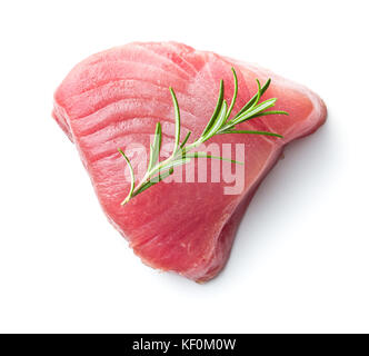 Fresh raw tuna steak and rosemary isolated on white background. Stock Photo