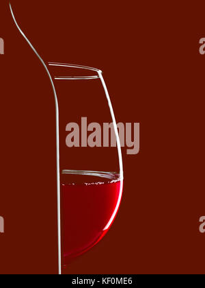 Elegant silhouette bottle of red wine and glass on black background.  Contour with gradient and highlights