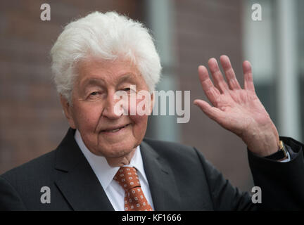 Stuttgart, Germany. 24th Oct, 2017. Choir director Gotthilf Fischer standing at a terrace in Stuttgart, Germany, 24 October 2017. For 7 decades Gotthilf Fischer has been bringing choir music to Germany's turntables. His music label awarded the composer and director of the Fischer Choir with a golden record for '70 years of recording'. Credit: Marijan Murat/dpa/Alamy Live News Stock Photo