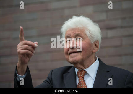 Stuttgart, Germany. 24th Oct, 2017. Choir director Gotthilf Fischer standing at a terrace in Stuttgart, Germany, 24 October 2017. For 7 decades Gotthilf Fischer has been bringing choir music to Germany's turntables. His music label awarded the composer and director of the Fischer Choir with a golden record for '70 years of recording'. Credit: Marijan Murat/dpa/Alamy Live News Stock Photo