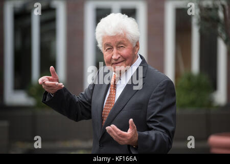 Stuttgart, Germany. 24th Oct, 2017. Choir director Gotthilf Fischer standing at a terrace in Stuttgart, Germany, 24 October 2017. For 7 decades Gotthilf Fischer has been bringing choir music to Germany's turntables. His music label awarded the composer and director of the Fischer Choir with a golden record for '70 years of recording'. Credit: Marijan Murat/dpa/Alamy Live News Stock Photo